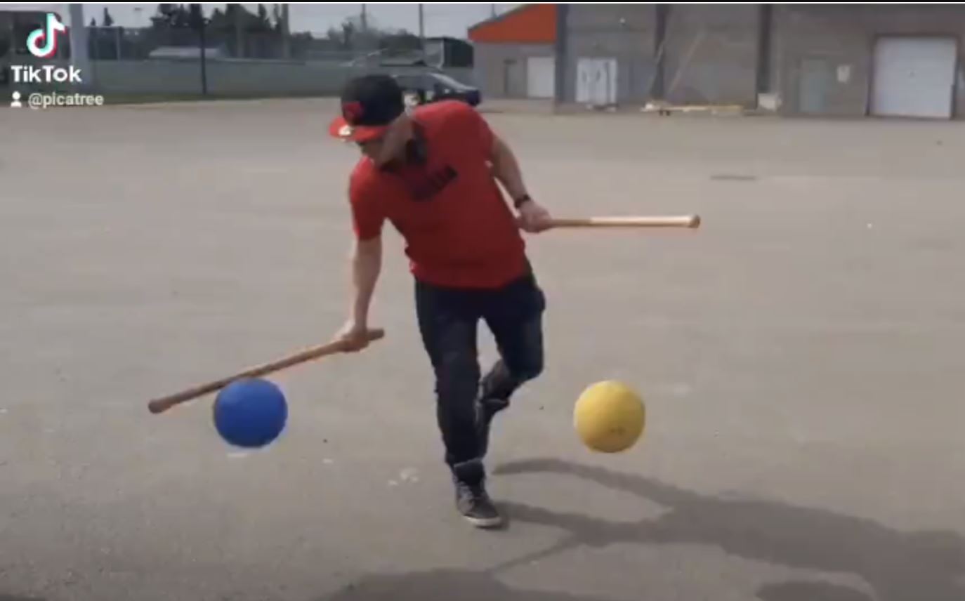 Doubletap player dribbling two balls with barlets