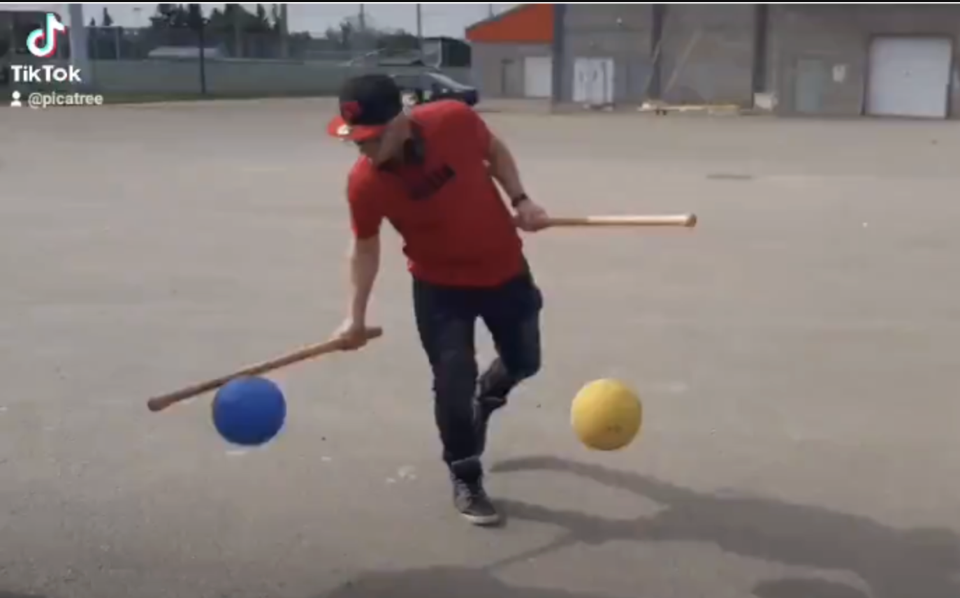 Doubletap player dribbling two balls with barlets